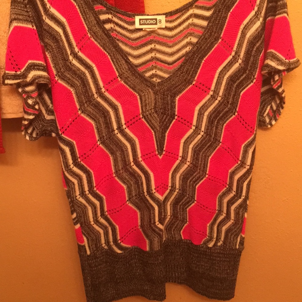 This is a Studio 8 blouse